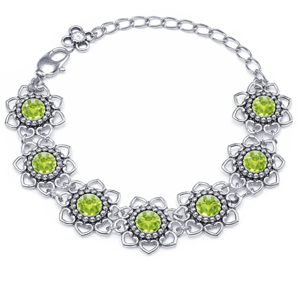 luisia-armband-leandra-mit-herzbl-ten-und-premium-kristallen-peridot-apfelgr-n image 1