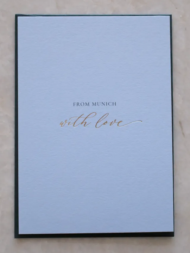heimatgl-ck-from-munich-with-love-postkarte-hellblau-mit-goldpr-gung image 1